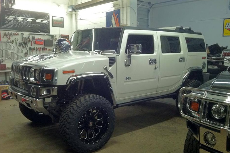 White Hummer being customized int the shop